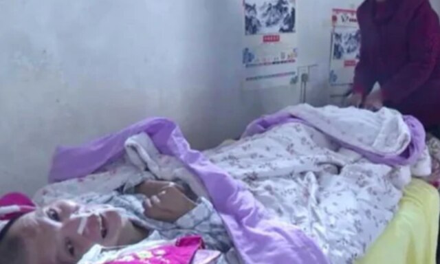 Chinese man wakes from 12-year coma after mum nurses him -Kidspot