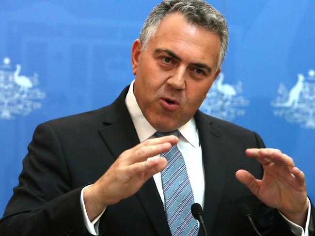 Budget pain ... Treasurer Joe Hockey reacts to the release of the Commission of Audit at Parliament House in Canberra. Picture; Kym Smith