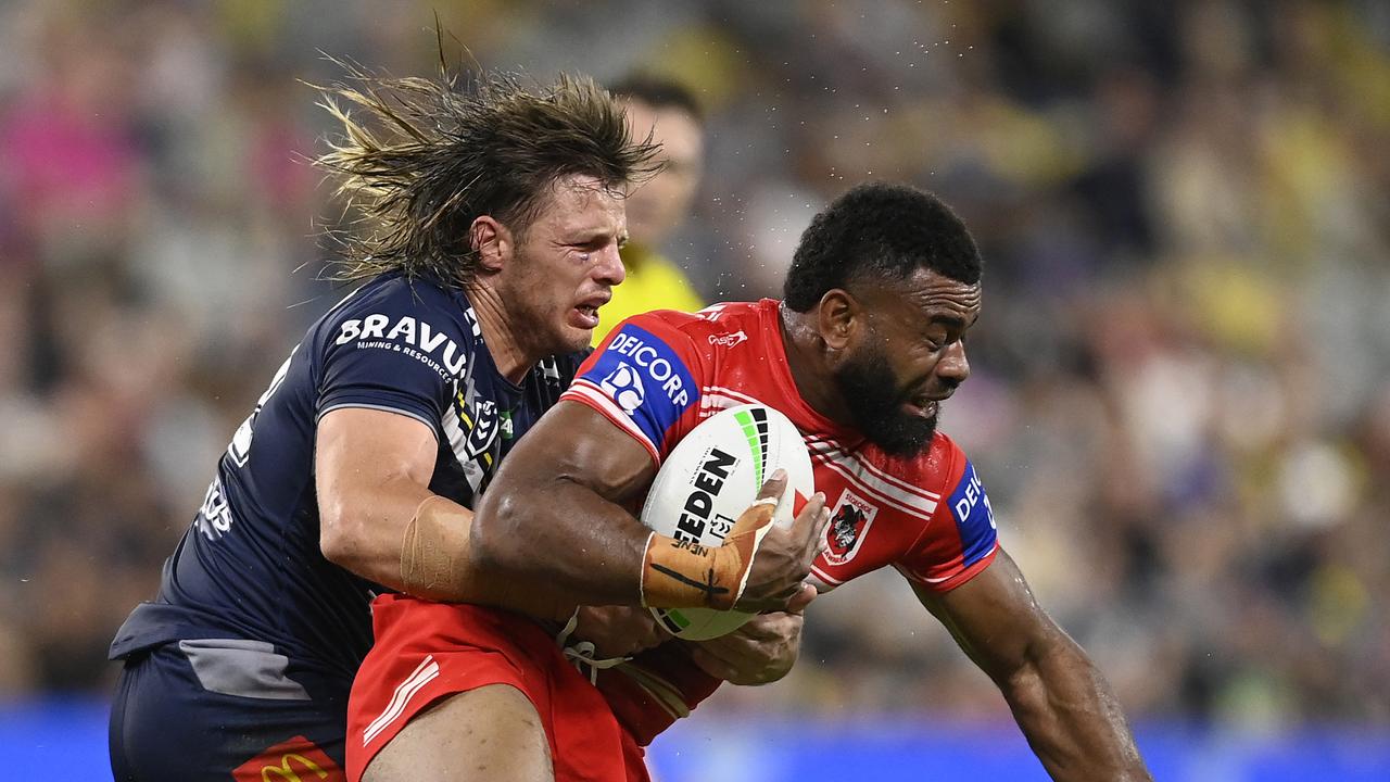 Mikaele Ravalawa is tackled by Jack Gosiewski. (Photo by Ian Hitchcock/Getty Images)