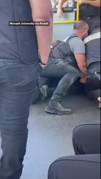 Man held down by officers on Melbourne bus