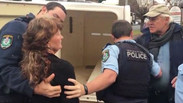 The owners of the organic food store being arrested on Thursday July 1. Picture: Instagram