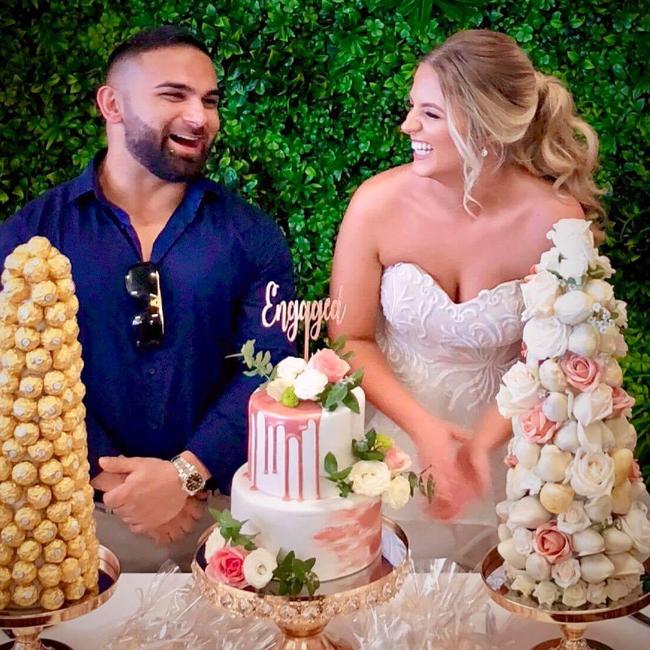 Sayet Erhan Akca with wife Georgia at an engagement celebration.