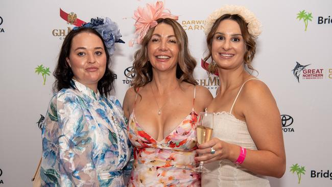 Rebecca Perry, Michelle Riggall and Zoe McGrath at the 2024 Darwin Cup Carnival Ladies Day. Picture: Pema Tamang Pakhrin