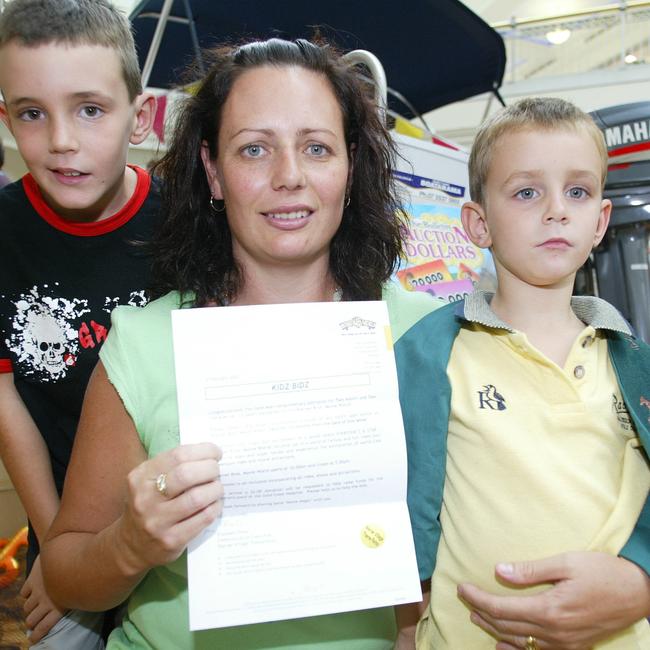 Lachlan 7 years, Katrina and Harrison 4 years Jones of Bonogin took home a Movie World pass for $100,000 in the blind auction.