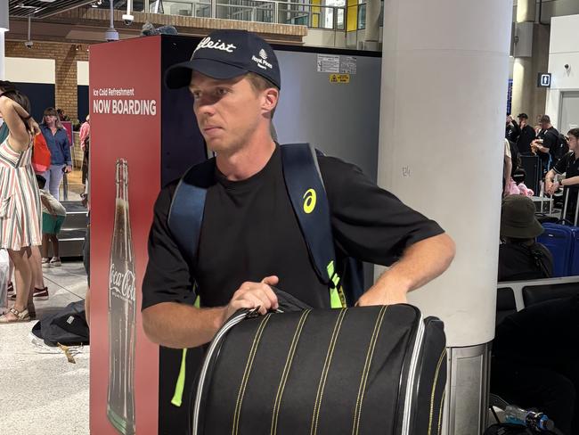 Nathan McSweeney arrives at Brisbane Airport