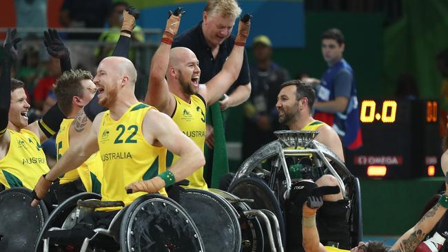 Team Australia celebrate after winning the match against the US in the rugby.