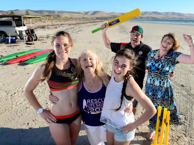 SHORE THING: Rachelle and Kristen Rothwell with their grandmother Jannette, and at rear, parents Simon and Sherryl at Aldinga. Picture: TRICIA WATKINSON.