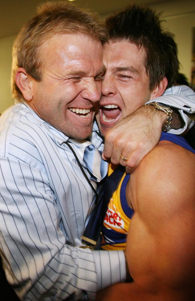 Cousins hugs Chris Mainwaring after the 2006 Grand Final. Picture: Michael Klein