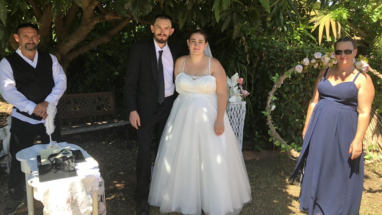 George and Jessica getting married under Annie's backyard mango tree.