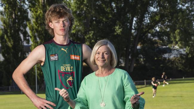 Tassie Devils footballer Jasper Hay and his mum Liz after getting tickets to the launch of the team. Picture: Chris Kidd