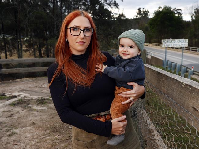 Amy Cotter with her son Archie at her family owned business Lilburndale, a wedding venue and 1200 acre cattle farm. The farm was really badly impacted by the recent flooding. Picture: Richard Dobson