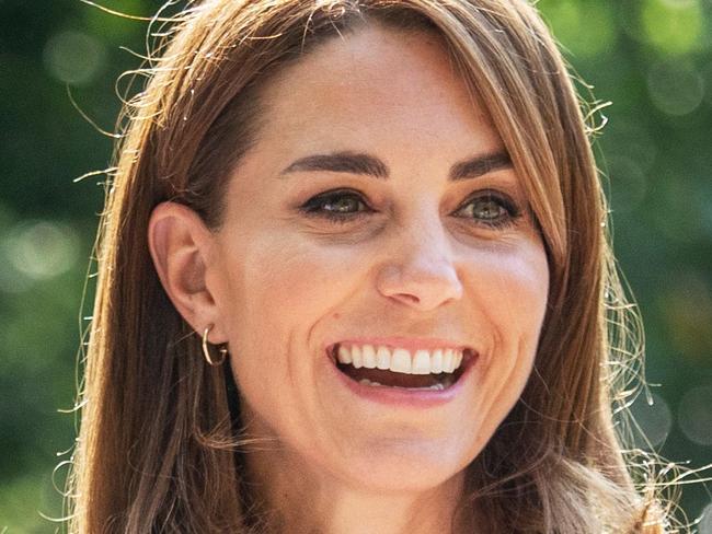 Britain's Catherine, Duchess of Cambridge, reacts as she meets with parents and children, and peer supporters, in Battersea Park, London on September 22, 2020, where she learned more about the benefits of parent-to-parent support. (Photo by Jack Hill / POOL / AFP)