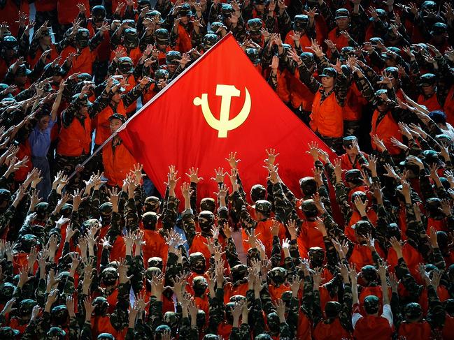 *2021 Getty Images Year In Review - News* - BEIJING, CHINA - JUNE 28:  Actors perform to celebrate the 100th anniversary of the founding of the Communist Party of China at Birds Nest on June 28, 2021 in Beijing, China. Ahead of the 100th anniversary of the party founding on July 1. Final preparations for events to mark the anniversary are under way in the Chinese capital.  (Photo by Lintao Zhang/Getty Images)