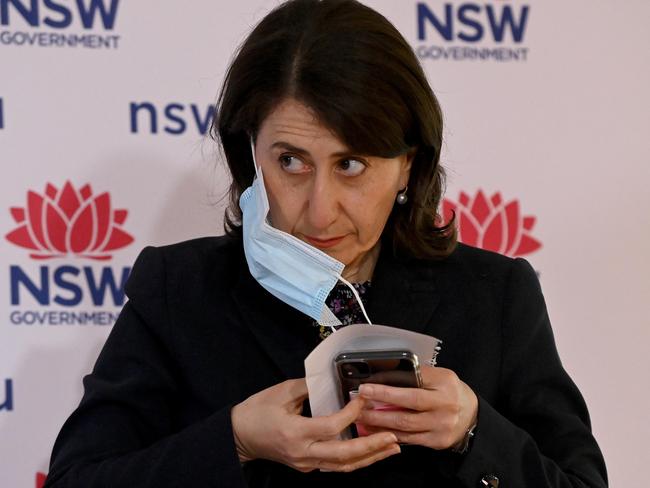 Gladys Berejiklian puts her mask back on after speaking to the media during a Covid-19 press conference in Sydney. Picture: NCA NewsWire/Bianca De Marchi