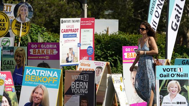 Voters are urged to bring their own pens and pencils. (AAP Image/Dave Hunt)\