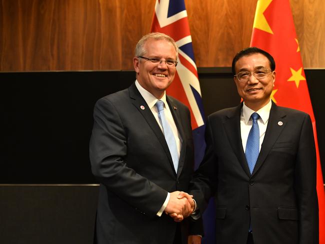 Australia's Prime Minister Scott Morrison (left) and Premier of the State Council of the People's Republic of China Li Keqiang at a bilateral meeting during the 2018 ASEAN Summit in Singapore, Wednesday, November 14, 2018. (AAP Image/Mick Tsikas) NO ARCHIVING