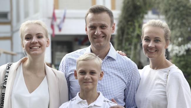 Alexei Navalny arrives to vote in Moscow with wife Yulia, son Zakhar and daughter Daria. Picture: AP