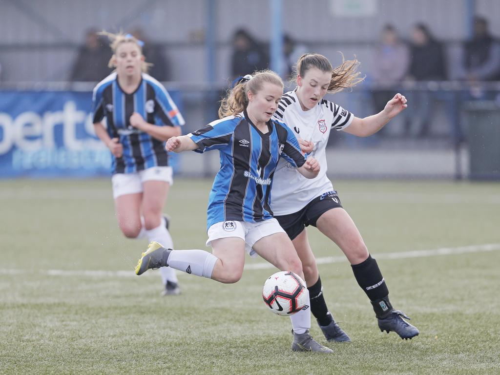 Hobart Zebras versus Kingborough Lions in the women's Statewide Cup final at KGV. Kingborough's Christabelle Moore, left, and Hobart's Zoe Nichols clash. Picture: PATRICK GEE