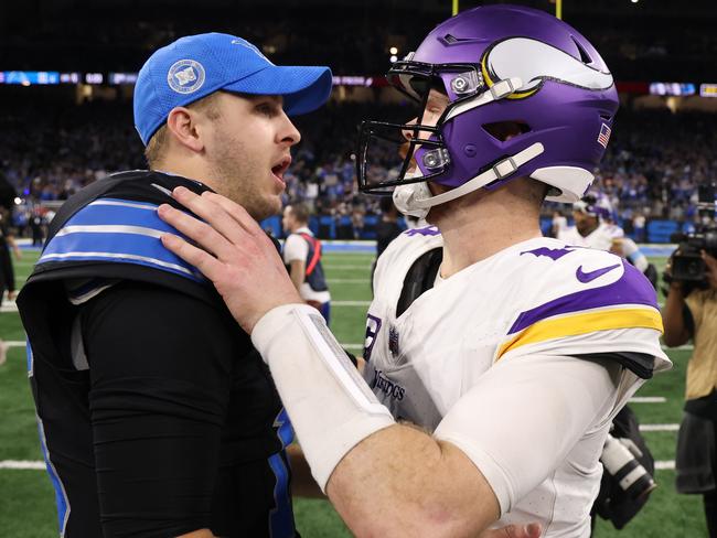 DETROIT, MICHIGAN – JANUARY 05: Jared Goff #16 of the Detroit Lions speaks with Sam Darnold #14 of the Minnesota Vikings after the game at Ford Field on January 05, 2025 in Detroit, Michigan. (Photo by Gregory Shamus/Getty Images)