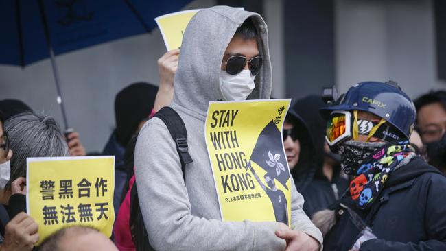 A pro-democracy protester supporting Hong Kong at Federation Square. Picture: Wayne Taylor.