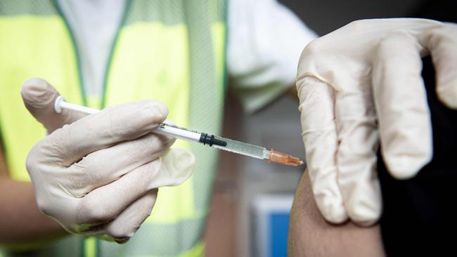 A man receives a dose of the Monkeypox vaccine at the Edison municipal vaccination centre in Paris. Picture: AFP