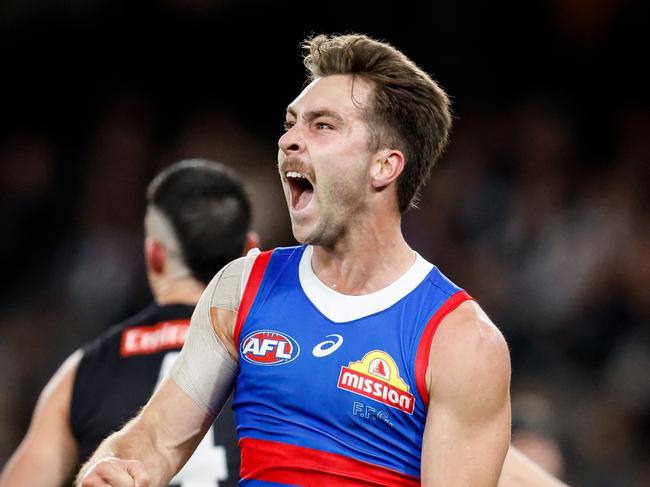 MELBOURNE, AUSTRALIA - MAY 31: Rhylee West of the Bulldogs celebrates a goal which put his team in front during the 2024 AFL Round 12 match between the Collingwood Magpies and the Adelaide Crows at The Melbourne Cricket Ground on May 31, 2024 in Melbourne, Australia. (Photo by Dylan Burns/AFL Photos via Getty Images)