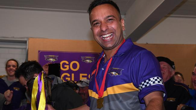 Winners are grinners: Singh after winning the 2019 EFL Premier Division grand final. Picture: AAP/James Ross.