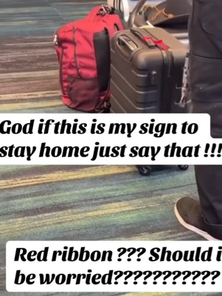 Other videos show travellers’ dramatic reactions when spotting a bag with a red ribbon. Picture: TikTok / @just_jirehh