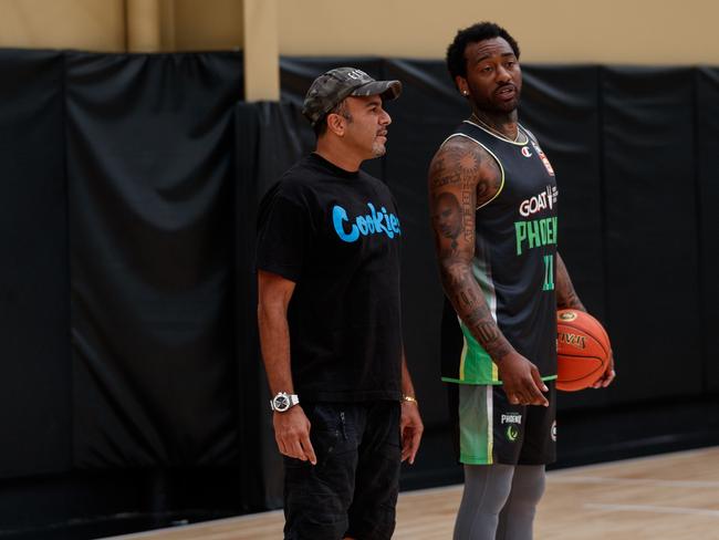 South East Melbourne Phoenix owner Romie Chaudhari with former NBA point guard John Wall. Credit: Phoenix Media