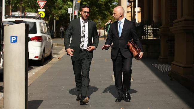 Vince Tesoriero with his lawyer outside of the Federal Court in Sydney. Picture: Jane Dempster