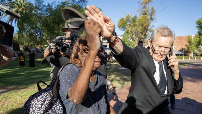 26-02-2024 – Explosive scenes outside court as a woman believed to be from Yuendumu confronts former NT police officer Zachary Rolfe after day one of him giving evidence at the inquest into the death of Kumanjayi Walker. Picture: Liam Mendes / The Australian