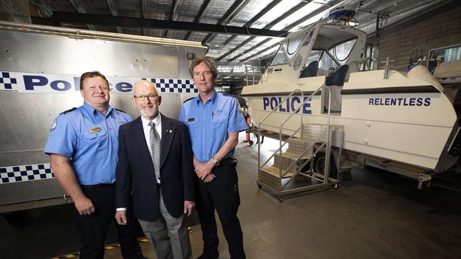 William (Bill) Folder who was presented with an Australian Search and Rescue Award for Outstanding Contribution to Search and Rescue with SES Regional Officer Mark Dance (LHS) and SES Regional Manager Mark Nelson (RHS) at Glenorchy Police Station. Picture Chris Kidd