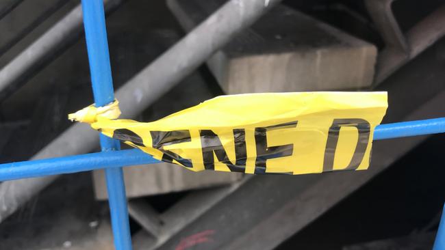 Crime scene tape at the scene. Picture: Shashi Baltutis