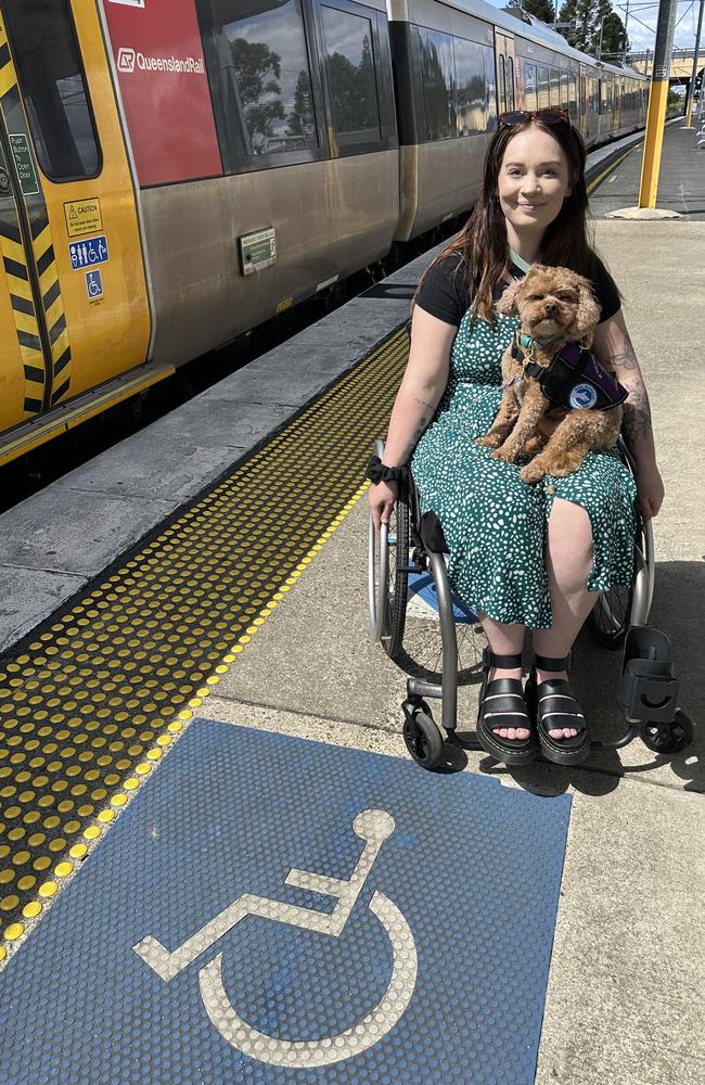 Grace Garrahy with her service dog Sebastian. Picture - contributed.