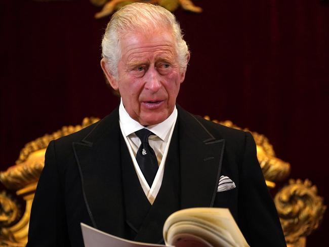 LONDON, ENGLAND - SEPTEMBER 10: King Charles III reacts during his proclamation as King during the accession council on September 10, 2022 in London, United Kingdom. His Majesty The King is proclaimed at the Accession Council in the State Apartments of St James's Palace, London. The Accession Council, attended by Privy Councillors, is divided into two parts. In part I, the Privy Council, without The King present, proclaims the Sovereign and part II where The King holds the first meeting of His Majesty's Privy Council. The Accession Council is followed by the first public reading of the Principal Proclamation read from the balcony overlooking Friary Court at St James's Palace. The Proclamation is read by the Garter King of Arms, accompanied by the Earl Marshal, other Officers of Arms and the Serjeants-at-Arms. (Photo by Victoria Jones - WPA Pool/Getty Images)