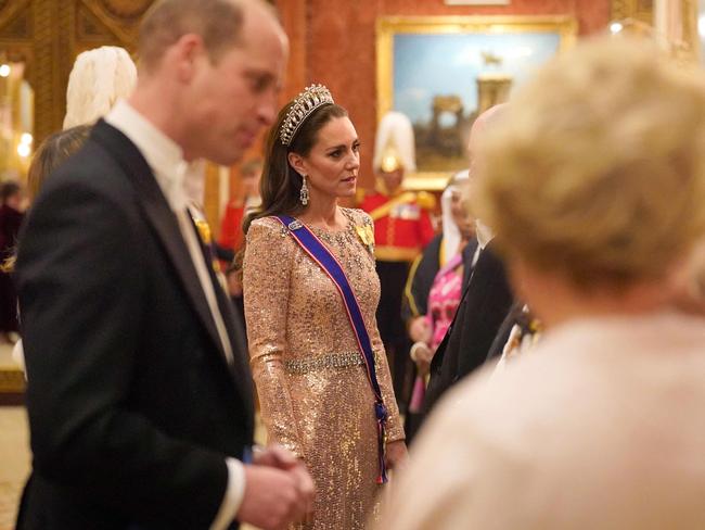 The event Catherine and William mingled with guests at the annual pre-Christmas event. Picture: AFP