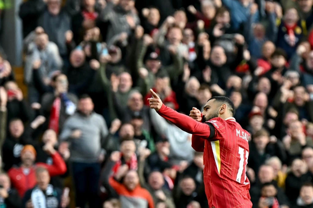 Mohamed Salah celebrates scoring in Liverpool's 2-1 win over Chelsea