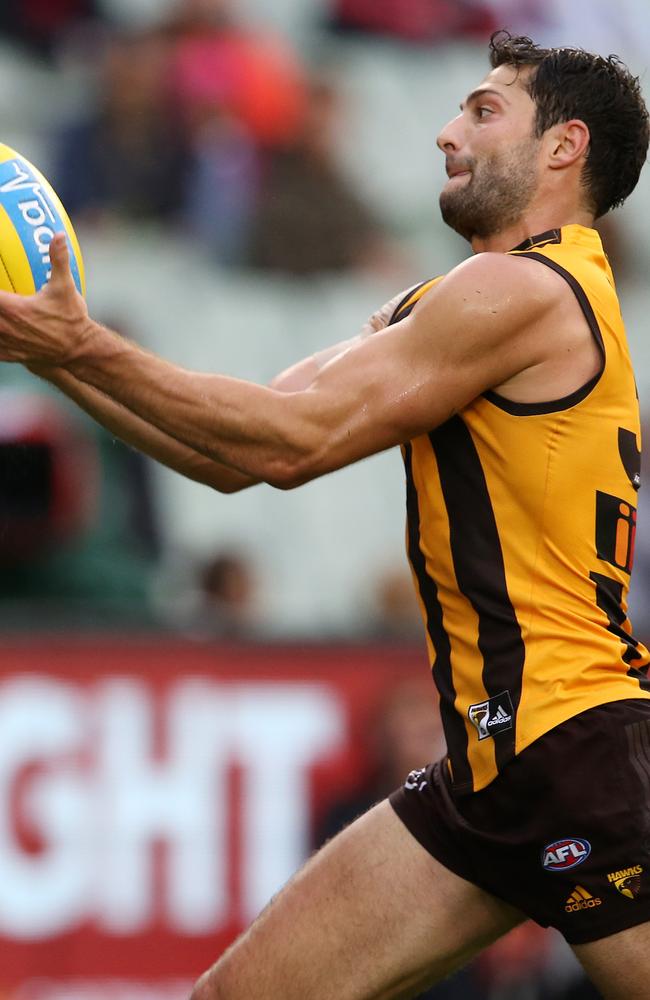 David Mirra marks on his AFL debut last year.