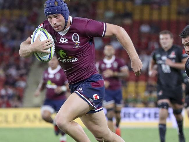 Hamish Stewart of the Reds heads to the try line during the Round 4 Super Rugby match between the Queensland Reds and the Sunwolves at Suncorp Stadium in Brisbane, Saturday, February 22, 2020. (AAP Image/Glenn Hunt) NO ARCHIVING, EDITORIAL USE ONLY