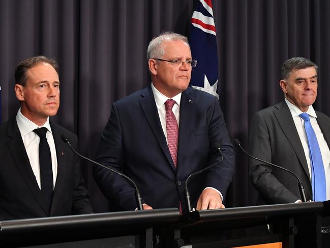 Minister for Health Greg Hunt, Prime Minister Scott Morrison and Chief Medical Officer Professor Brendan Murphy. Picture: AAP