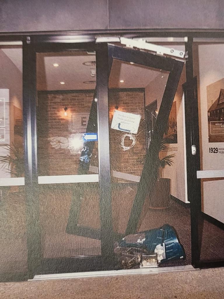 Evidence photos show the damage to the hotel's front door. Picture: Supplied by Courts SA.