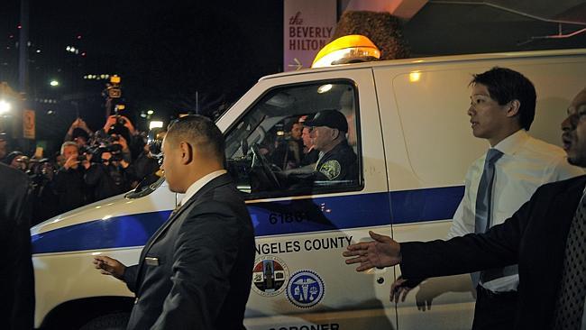  A coroner's van carrying the body of Whitney Houston leaves the Beverly Hilton Hotel in California.