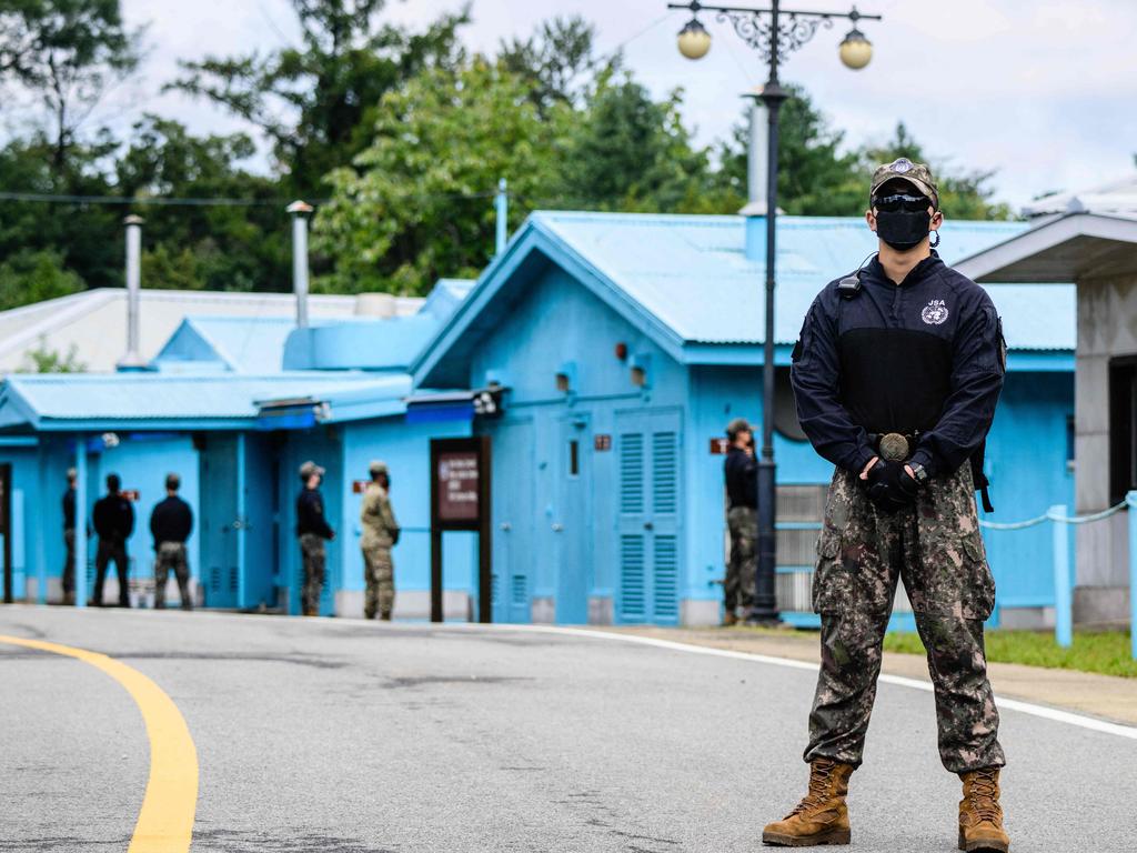 South Korean and United Nations Command soldiers at the Joint Security Area of the Demilitarised Zone in the truce village of Panmunjom from where Travis King absconded. (Photo by ANTHONY WALLACE / AFP)