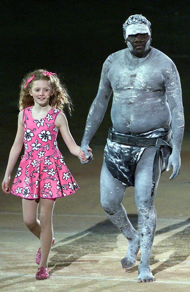 Nikki Webster with aboriginal performer Djakapurra Munyarryun in the Sydney Olympic Games opening ceremony.