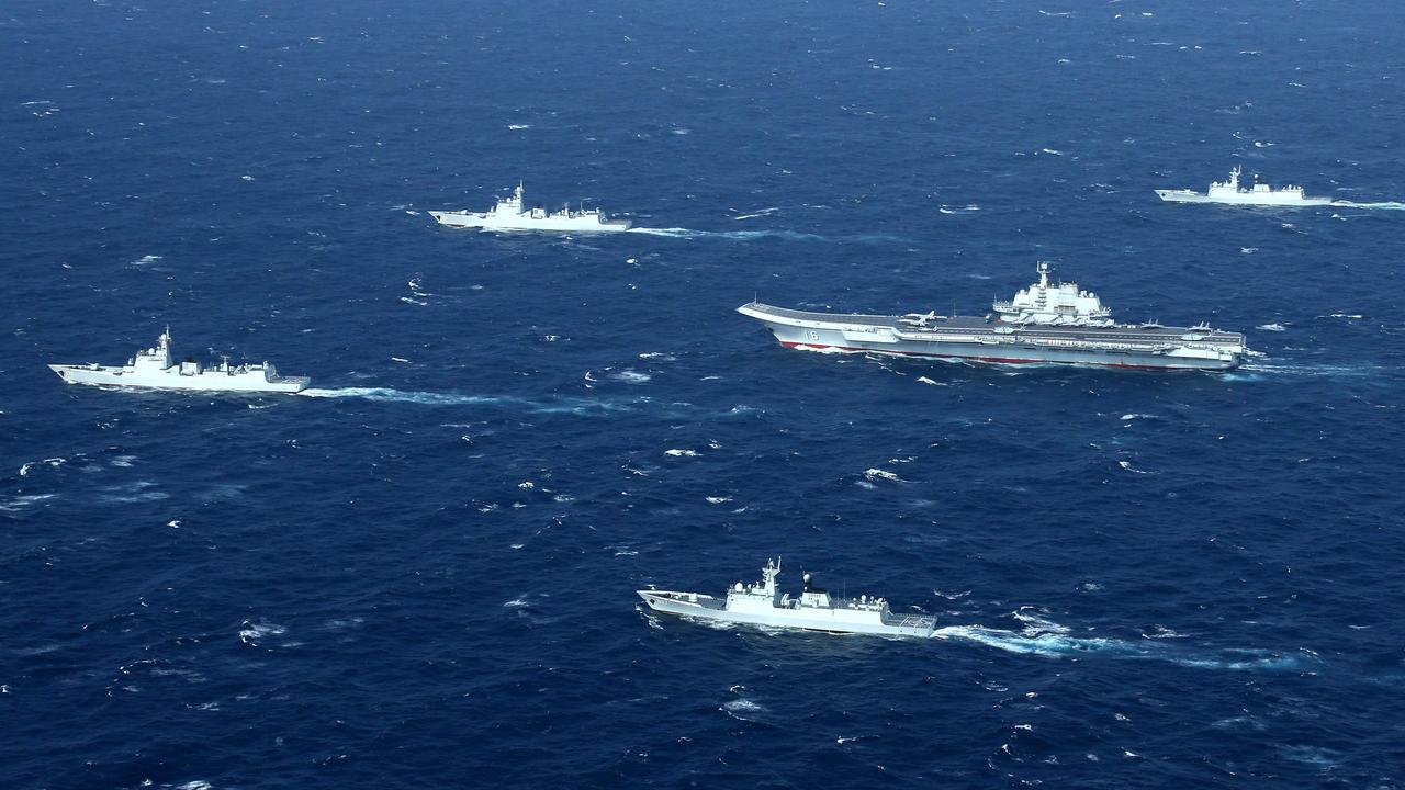 An aerial file photo shows a Chinese navy formation during military drills in the South China Sea on January 2, 2017. Picture: STR / AFP.