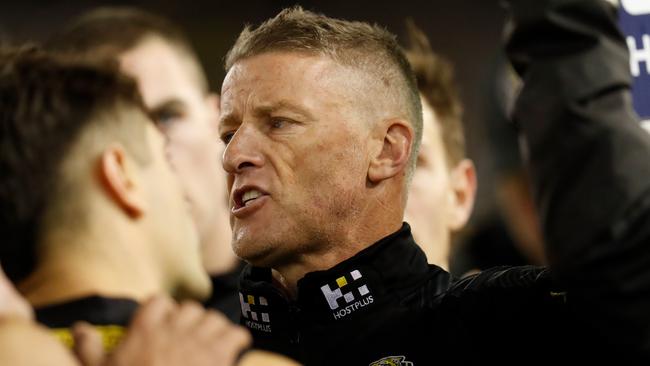 MELBOURNE, AUSTRALIA - MAY 15: Damien Hardwick, Senior Coach of the Tigers addresses his players during the 2021 AFL Round 09 match between the Richmond Tigers and the GWS Giants at Marvel Stadium on May 15, 2021 in Melbourne, Australia. (Photo by Michael Willson/AFL Photos via Getty Images)