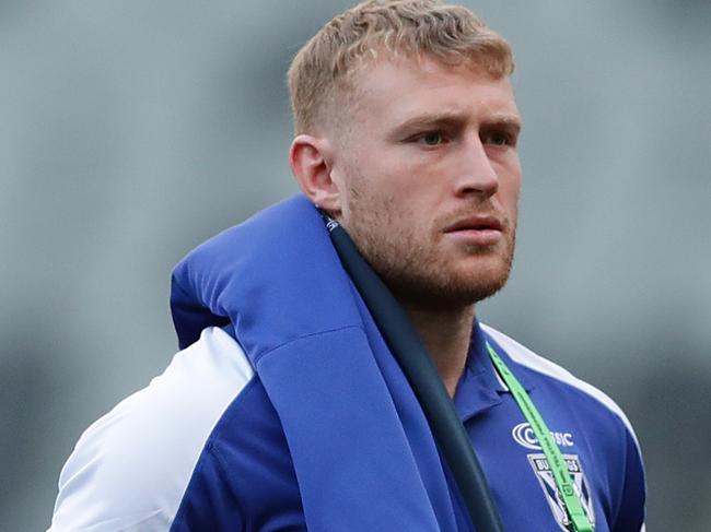 SYDNEY, AUSTRALIA - JULY 05: Luke Thompson of the Bulldogs inspects the pitch during the round eight NRL match between the Canterbury Bulldogs and the South Sydney Rabbitohs at Bankwest Stadium on July 05, 2020 in Sydney, Australia. (Photo by Mark Metcalfe/Getty Images)