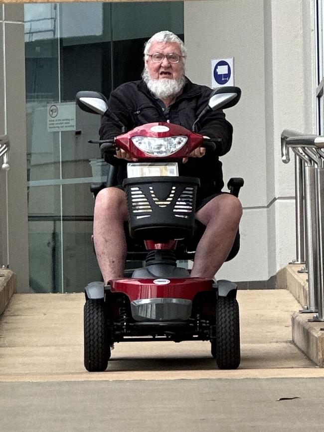 John Francis Kerrigan, 81, parked his mobility scooter next to the bar table where his solicitor and barrister sat in Rockhampton District Court, with special court hearing aids in, as he listened to the court proceedings after pleading guilty to three counts of indecent treatment of a child under 16 on October 9, 2024.