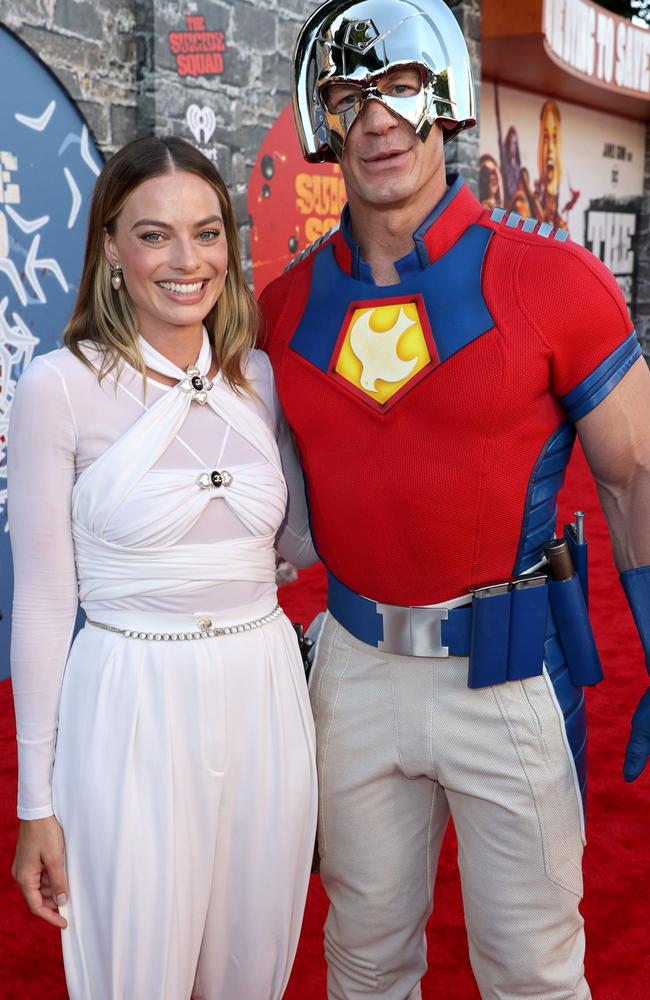 Robbie with her co-star John Cena. Picture: Kevin Winter/Getty Images