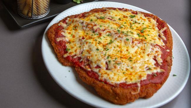One of Cascade Hotel’s giant chicken parmies. Picture: Linda Higginson